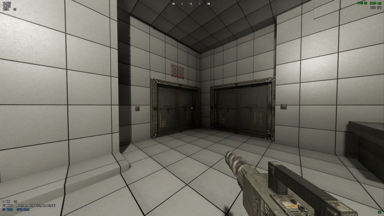 A white tiled corridor with two sealed metal doors